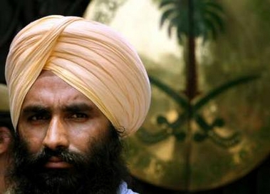 An Indian Sikh attends a protest outside the embassy of Saudi Arabia in New Delhi August 24, 2006. The Sikhs were protesting after six teenagers were accused of forcibly cutting the hair of a Sikh boy in the Indian state of Rajasthan, and against the reported harassment of Sikhs living in Saudi Arabia, who were being asked to shave off their beards and cut their hair. REUTERS/Desmond Boylan (INDIA) Reuters - Aug 24 5:17 AM